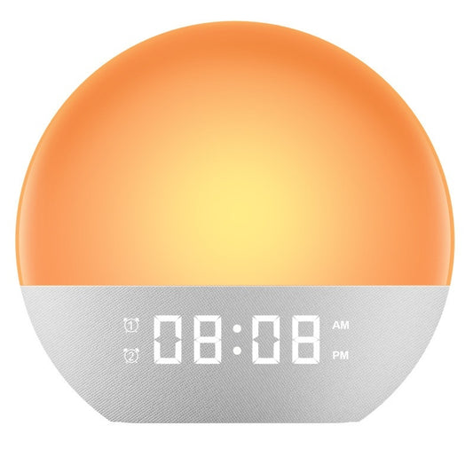 The Sunrise Clock with a warm amber light and digital time display
